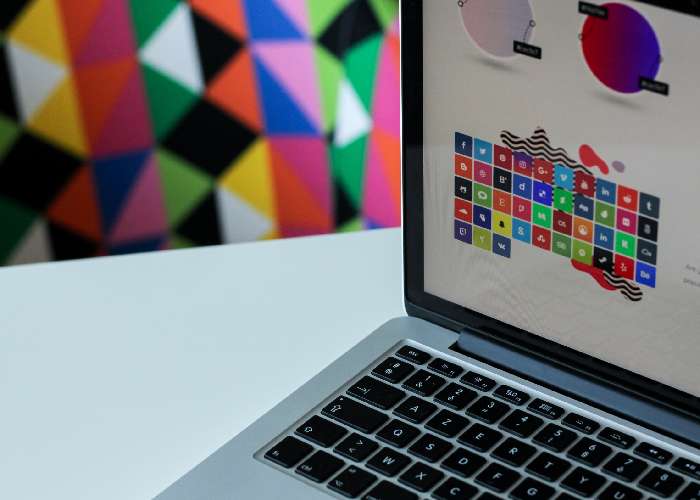 image of laptop screen showing graphic design in progress
